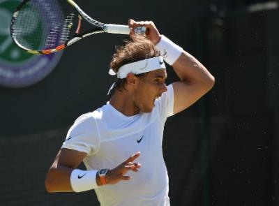 Рафаэль Надаль переигрывает Карена Хачанована кортах Wimbledon