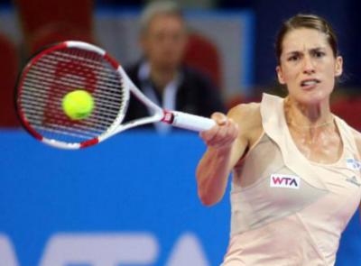 Андреа Петкович переигрывает Гарбин Мугурусу на Qatar Total Open
