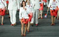 Агнешка Радваньска несет флаг на Олимпиаде 2012 года